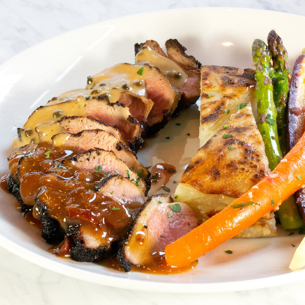 French Hen Restaurant in Tulsa, Oklahoma Grilled Duck Breast with brandy peppercorn cream 